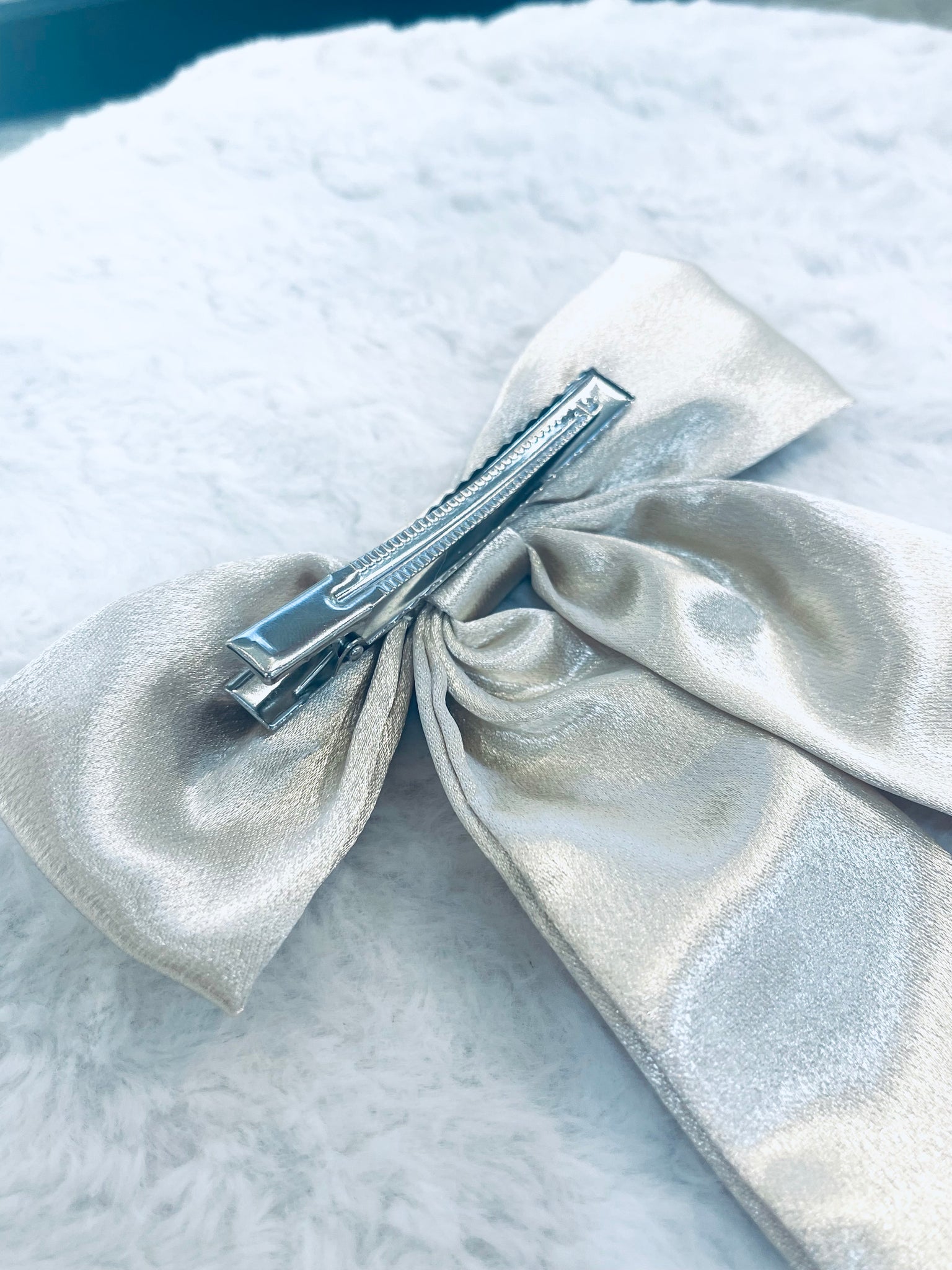 'With The Trend" (beige) satin bow