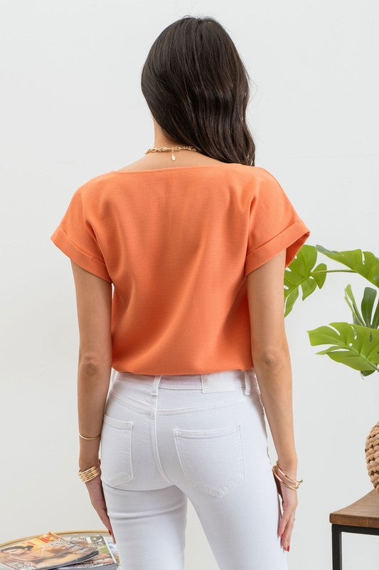 "Casual Outlook" (orange) top