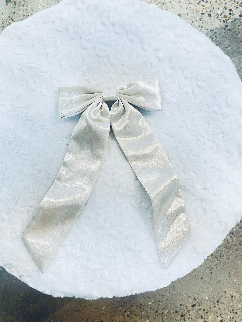 'With The Trend" (beige) satin bow