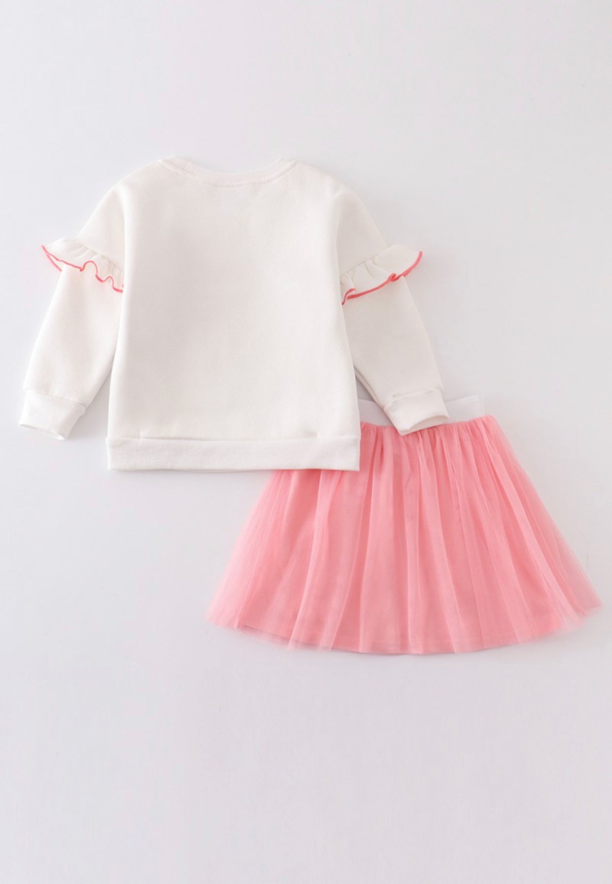 “Candy Cane Crew” skirt or top (sold separately)