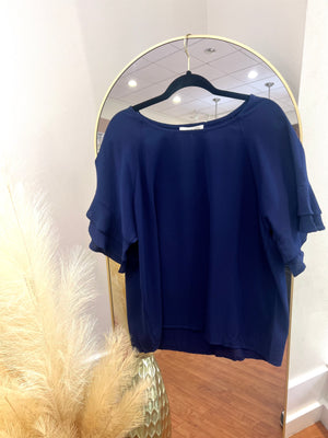 “Prettier In Color” (navy) plus top