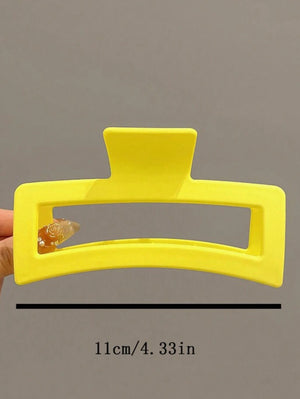 “Hair Needs” (yellow) claw clip