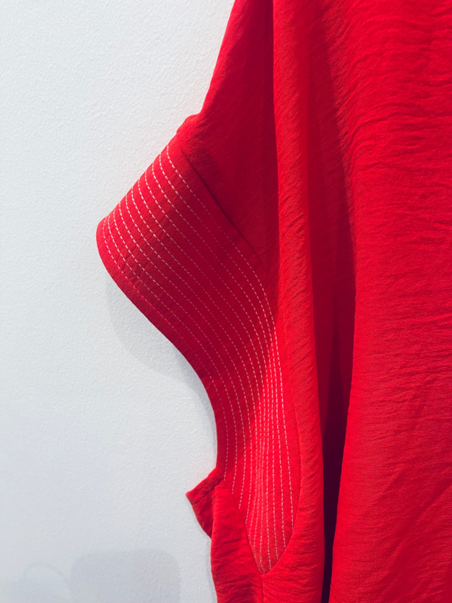 "Radiate Boldness" (red) plus top