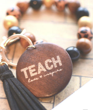 "Teach Love Inspire" o-ring